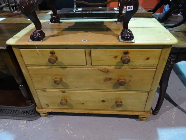 A Victorian pine chest of two short and two long drawers, on turned feet, 109cm wide x 84cm high.  I9