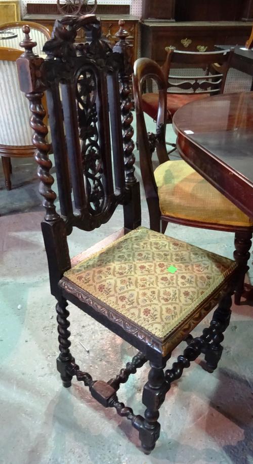 A pair of Victorian oak side chairs, each with pierced back and barleytwist supports, 46cm wide x 109cm high, (2).  D8