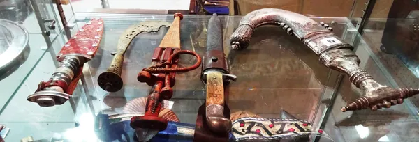A metal mounted jambiya, a late 19th century French bayonet, a Swedish knife, a kukri and related items, (qty).   CAB