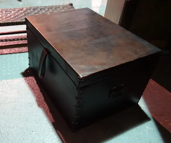 An early 20th century lift top trunk, with studded leather upholstery, 66cm wide x 40cm high, and a 20th century oak and leather rectangular footstool