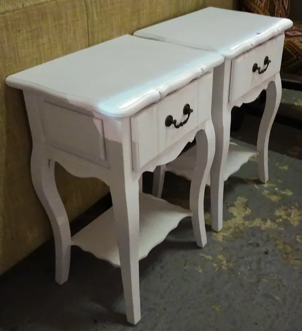 A pair of 20th century white painted serpentine bedside tables, 45cm wide x 65cm high, (2).  L8