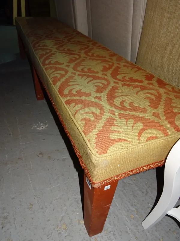 A large 20th century upholstered rectangular footstool, on square tapering supports, 215cm wide x 45cm high.  L7