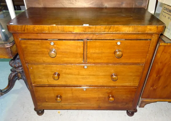 A Victorian walnut chest of two short and two long drawers, on bun feet, 96cm wide x 90cm high.  M6