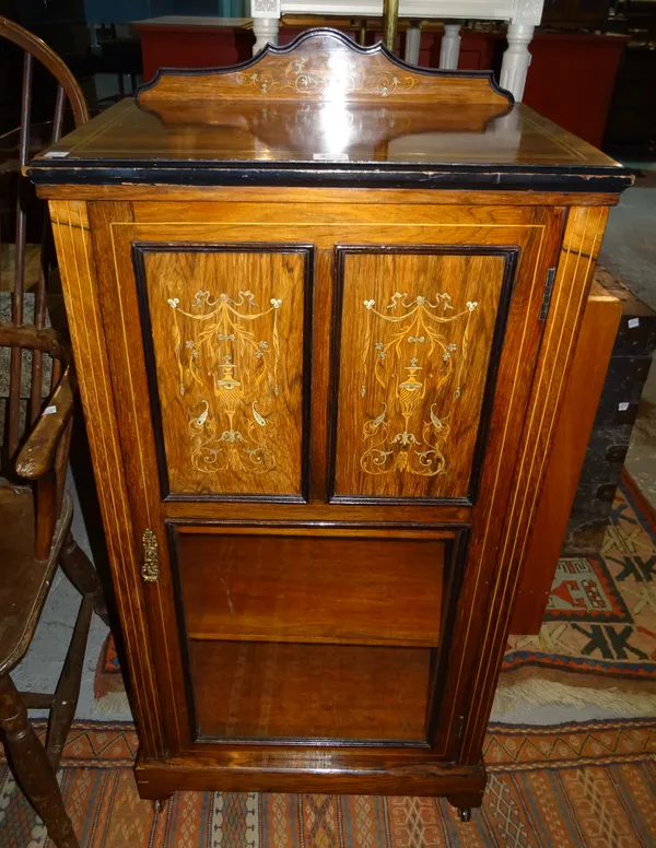 A late Victorian rosewood inlaid display cabinet, with panelled doors, 55cm wide x 110cm high.  J6