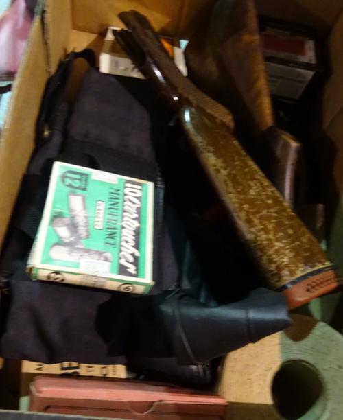 Sporting interest; a group of shooting related items including; two stocks, two gun slips and sundry, (qty).   S1M