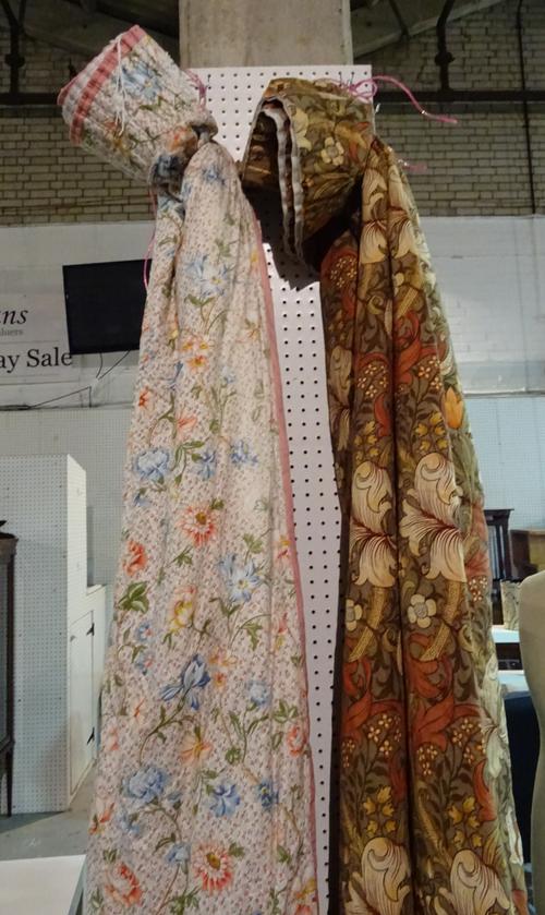 After William Morris; a pair of floral curtains, 280cm wide at bottom x 198cm drop and another pair of floral curtains, 156cm wide at bottom x 240cm d
