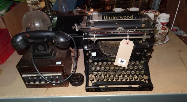 An Underwood typewriter and a switchboard Bakelite phone, (2).   S2M