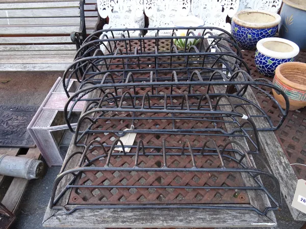 A group of four 20th century metal hay mangers, 73cm wide and two smaller, 64cm wide, (6). OUT