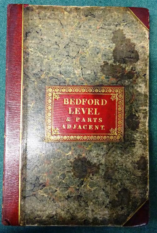 FENLAND - The Great Level of the Fens called Bedford Level. 81 x 79cms. within ruled borders, hand-coloured & folded on linen into half morocco & marb