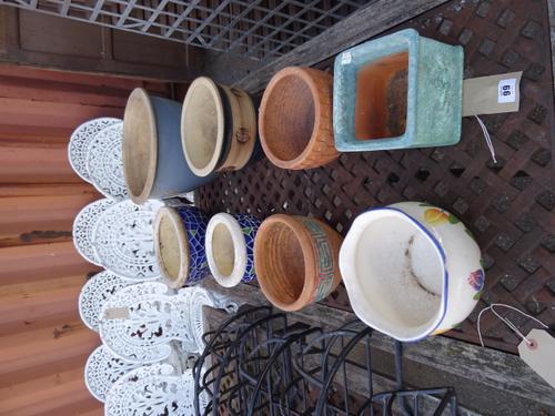Garden statuary, including; seven 20th century terracotta pots and one other, (8).  OUT