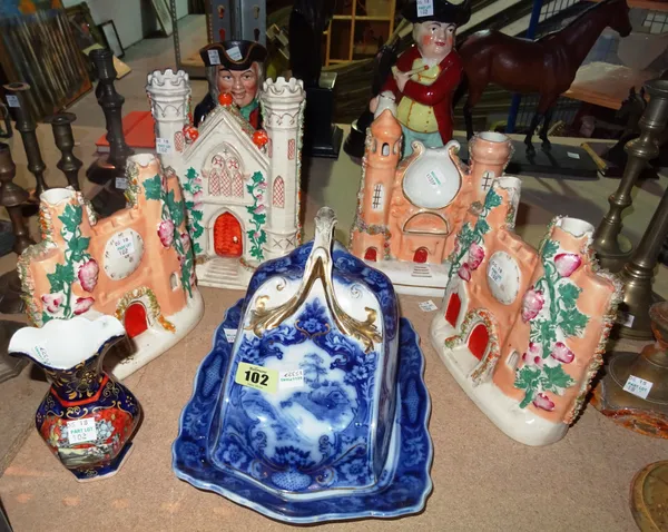 Ceramics, including; a blue and white transfer printed cheese dish, Staffordshire spill vases and Toby jugs, (qty).    S3M