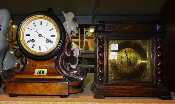 A 20th century small oak mantel clock, (key and pendulum) and a French 19th century walnut mantel clock with dolphin supports, (key and pendulum), (2)