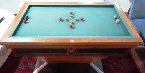 Finale; an early 20th century French bar billiards style games table, 88cm wide x 94cm high. BAY1