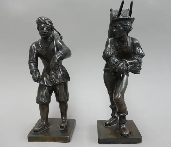 A pair of French bronze figures, late 19th century, modelled and cast as faggot gatherers, on canted square plinths, 22.5cm high, (2).
