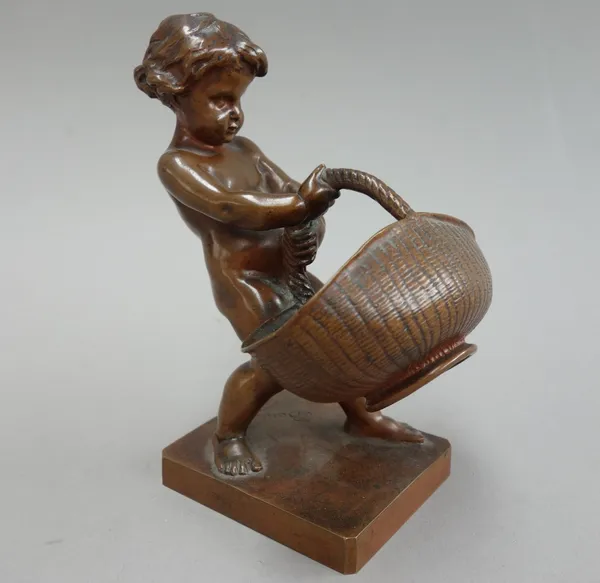 Louis-Ernest Barrias (French, 1841-1905), a small bronze model of a putto carrying a basket, cast by F. Barbedienne, 14cm high.