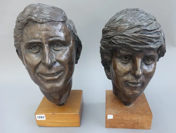 A pair of bronze busts depicting Prince Charles and Lady Diana, late 20th century, signed 'A. Jeffrey' to the case and mounted on oak plinths, 40cm hi
