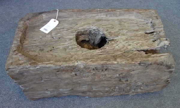 A hardwood mortar of naturalistic rectangular form, 88cm x 46cm x 38cm.