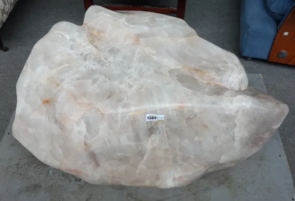 A large rose quartz mineral specimen of polished natural form, 95cm wide.