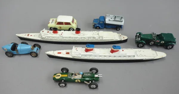 Five die-cast vehicles comprising; 227 Morris mini cooper (competition model), 155 Lotus-climax (F1 racing car), 763 Schuco Piccolo, Y6 Lesney Bugatti