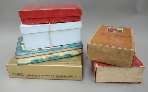 A quantity of vintage wooden jigsaw puzzles, including; three Victory 'gold box' puzzles, a Jones & Co puzzle from the 'South African Series', and man