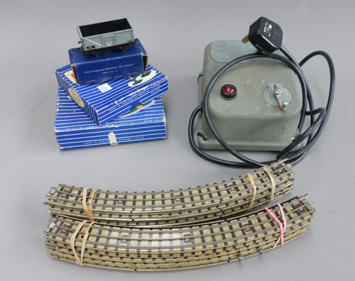 A quantity of Hornby Dublo OO gauge railway items, including; an EDL18 standard 2-6-4 tank locomotive, a DI island platform, a DI level crossing, wago