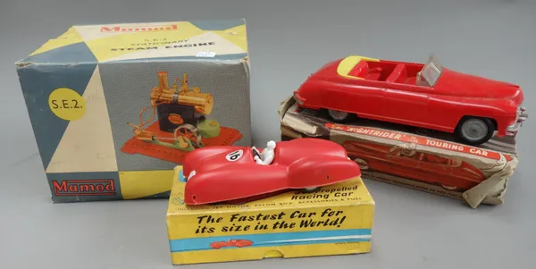 A quantity of vintage toys, including; a Jetex jet propelled racing car, a 'Nightrider' deluxe touring car, a Jetex helicopter, a Mamod S.E.2 stationa
