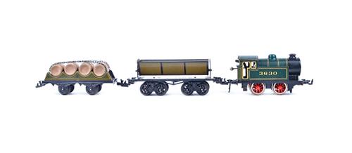 A Bing O gauge clockwork locomotive, 0-4-0, green livery, no.3630, boxed, together with a Bing Kippwagen and one further Bing wagon, both boxed, (3).