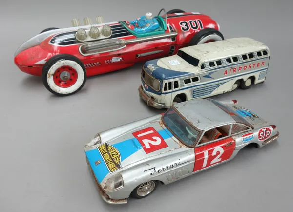 A collection of tin-plate toys, including; a Triang 'Wakouwa', a Silver Arrow aeroplane, boxed, a Japanese 'TM' racing car (46cm), a Minic accessory p