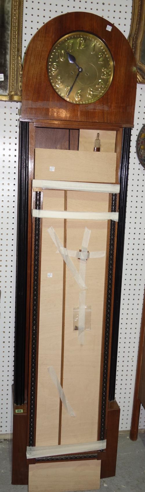 An Austrian mahogany longcase clock, in the Secessionist style, circa 1910, 196cm high, (one pendulum, two brass cased weights, one key, one door key)