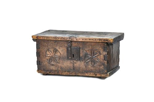 An 18th century Spanish walnut offering box, of plank construction, with carved floral decoration, 65cm wide x 32cm high x 33cm deep. Illustrated