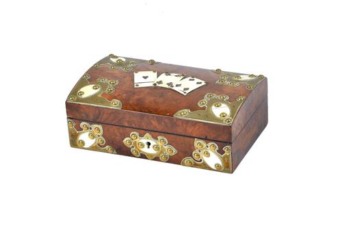 A Victorian gilt metal and ivory mounted dome top playing card box, 22cm wide x 8cm high x 14cm deep. Illustrated