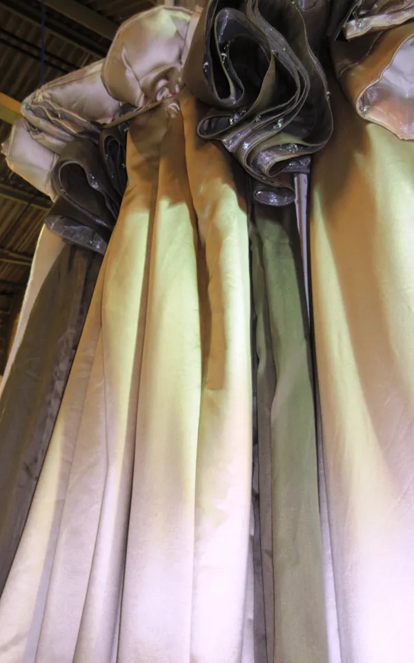 Curtains, comprising; a pair of champagne gold coloured silk, lined and interlined curtains, and a pair of truffle coloured voile curtains, 194cm wide