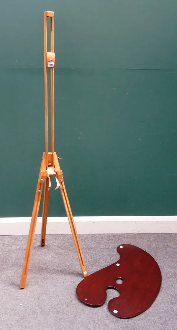 Windsor & Newton, London; a 20th century beech folding artist's easel, together with a palette, 64cm wide, (2). AS