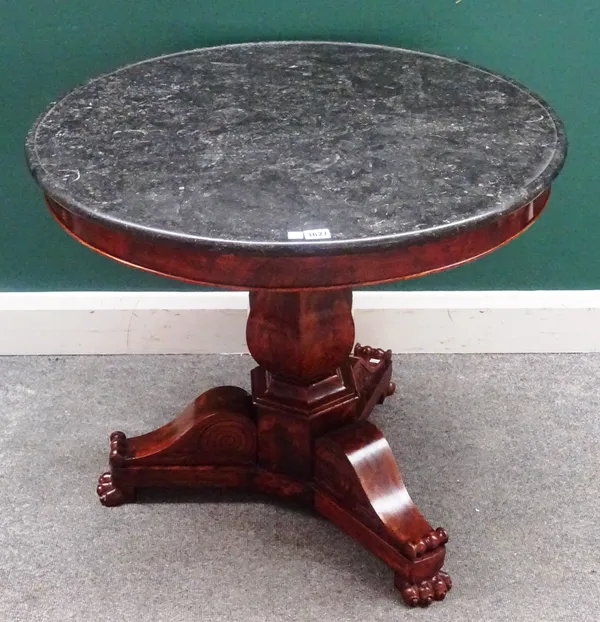 A 19th century Louis Philippe gueridon, the circular dished marble top on a square baluster mahogany column and three lion's paw feet, 81cm diameter x