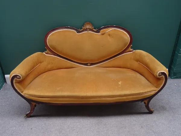 A French late 19th century gilt bronze mounted mahogany salon suite, to comprise; a sofa 166cm wide x 90cm high, an open armchair, a tub chair and two