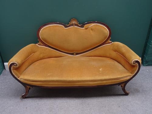 A French late 19th century gilt bronze mounted mahogany salon suite, to comprise; a sofa 166cm wide x 90cm high, an open armchair, a tub chair and two