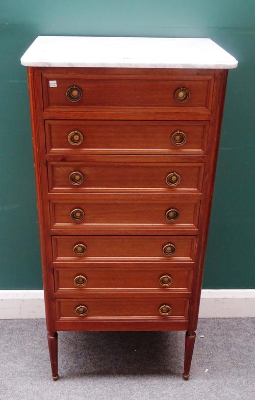 A Louis XVI style tall chest, the rectangular marble top over seven drawers, on tapering fluted supports, 57cm wide x 120cm high x 36cm deep.