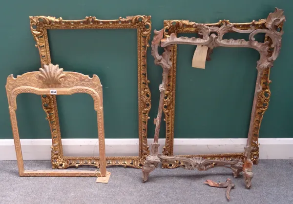 A pair of 19th century acanthus carved and pierced gilt frames, 57cm x 87cm, together with two 18th century mirror frames, (a.f), (4).