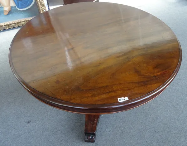 A William IV mahogany centre table, the circular snap-top on tapering hexagonal column and triform platform, on scroll feet, 122cm deep x 74cm high.