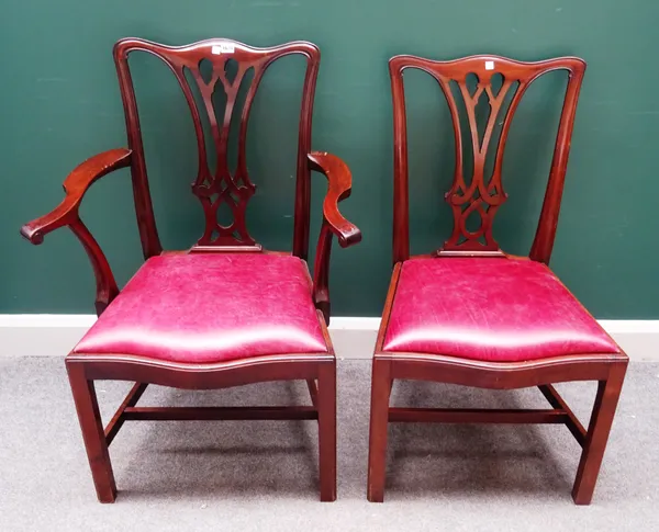 A set of twelve George III style mahogany framed dining chairs, circa 1900, each with pierced splat and serpentine seat, on canted block supports, to