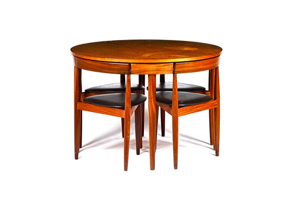 Hans Olsen for Frem Rojle; a 1960s teak 'Roundette' dining set comprising; a circular table, 107cm deep x 74cm high, together with four chairs, (5). I
