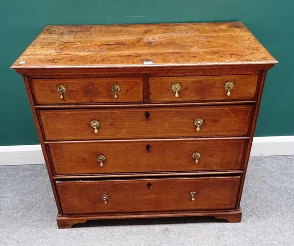 An early 18th century inlaid oak chest of two short and three long graduated drawers, on bracket feet, 100cm wide x 90cm high x 55cm deep.