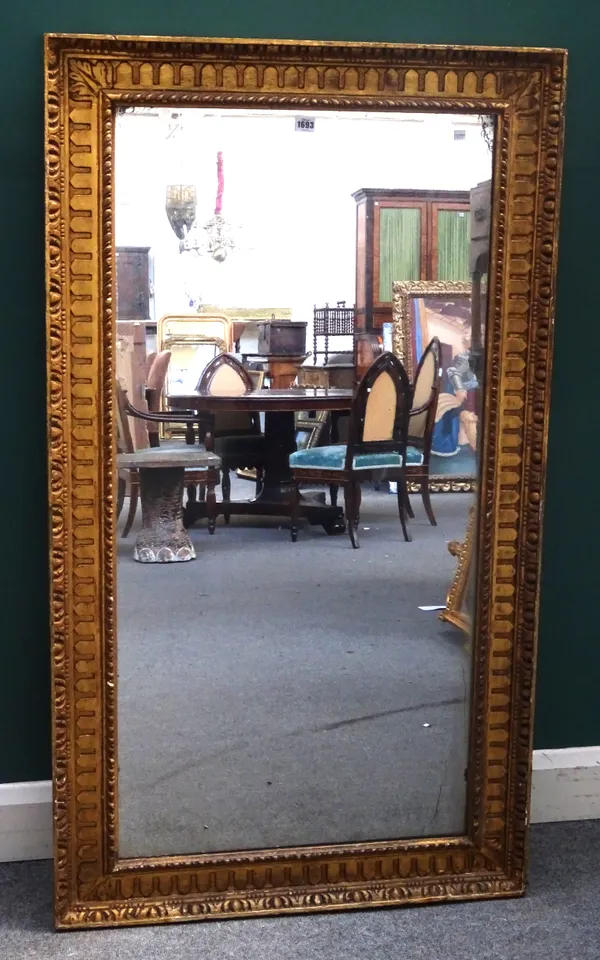 A 19th century gilt framed rectangular mirror, with egg and dart moulded frame, 81cm wide x 143cm high.