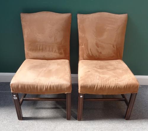 A set of eight mid-18th century style suede upholstered dining chairs, with hump back on square supports, 50cm wide x 95cm high, (8).
