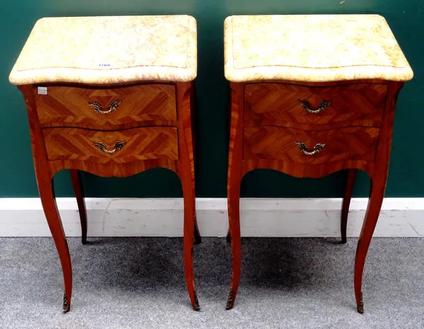A pair of Louis XV style bedside tables, each with serpentine marble top over a kingwood two drawer base, on cabriole supports, 39cm wide x 74cm high