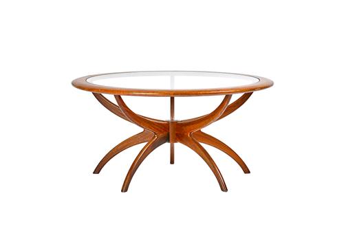 G Plan; a mid-20th century teak framed Astro occasional table, with circular glass inset top, 91cm deep x 46cm high. Illustrated