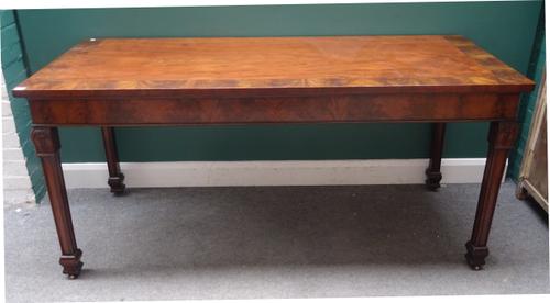A George III mahogany serving table, the crossbanded rectangular top on block supports, 178cm wide x 82cm high x 75cm deep.