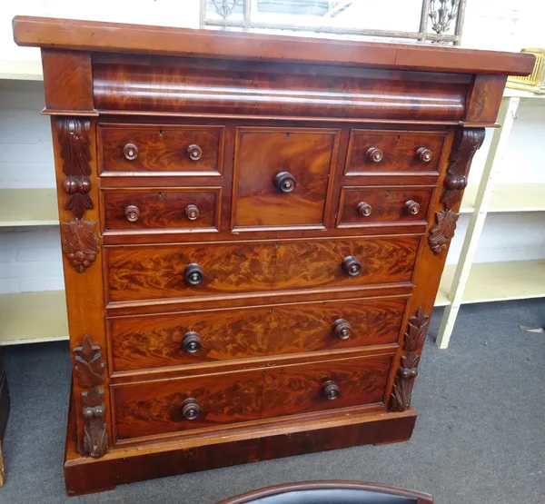A 19th century Scottish mahogany chest, with one long cushion drawer over five various short drawers, on a plinth base, 132cm wide x 146cm high x 58cm