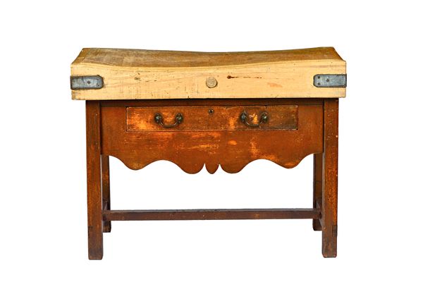 A butcher's block, the rectangular beech top on an oak single drawer base, with shaped frieze and block supports, 121cm wide x 91cm high x 61cm deep.