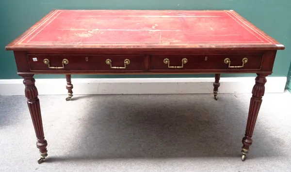 A 19th century mahogany centre writing table, the rectangular top with pair of frieze drawers and dummy opposing, on tapering reeded supports, 133cm w